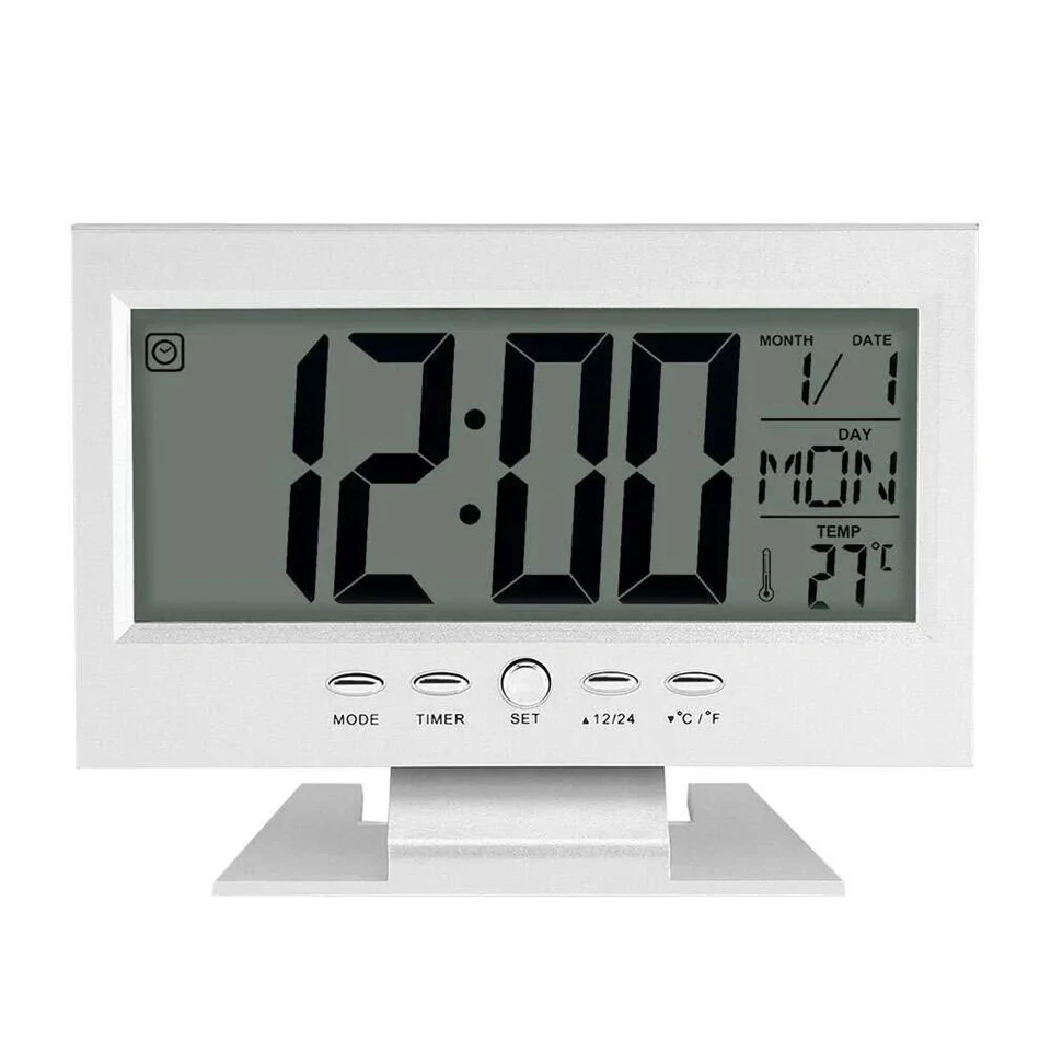 Hangra/tapsra működő LCD kijelzős asztali óra