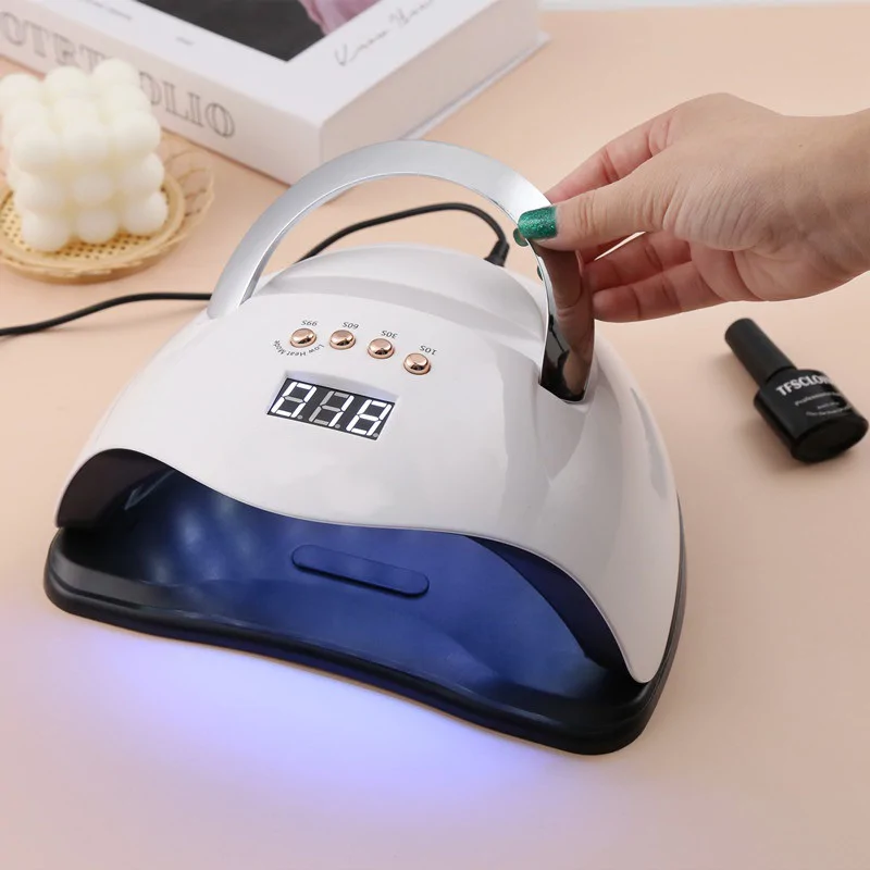 SUN Y9 UV LED professzionális műkörmös lámpa telefontartóval, beépített mozgásérzékelővel és hordozófüllel - 192W