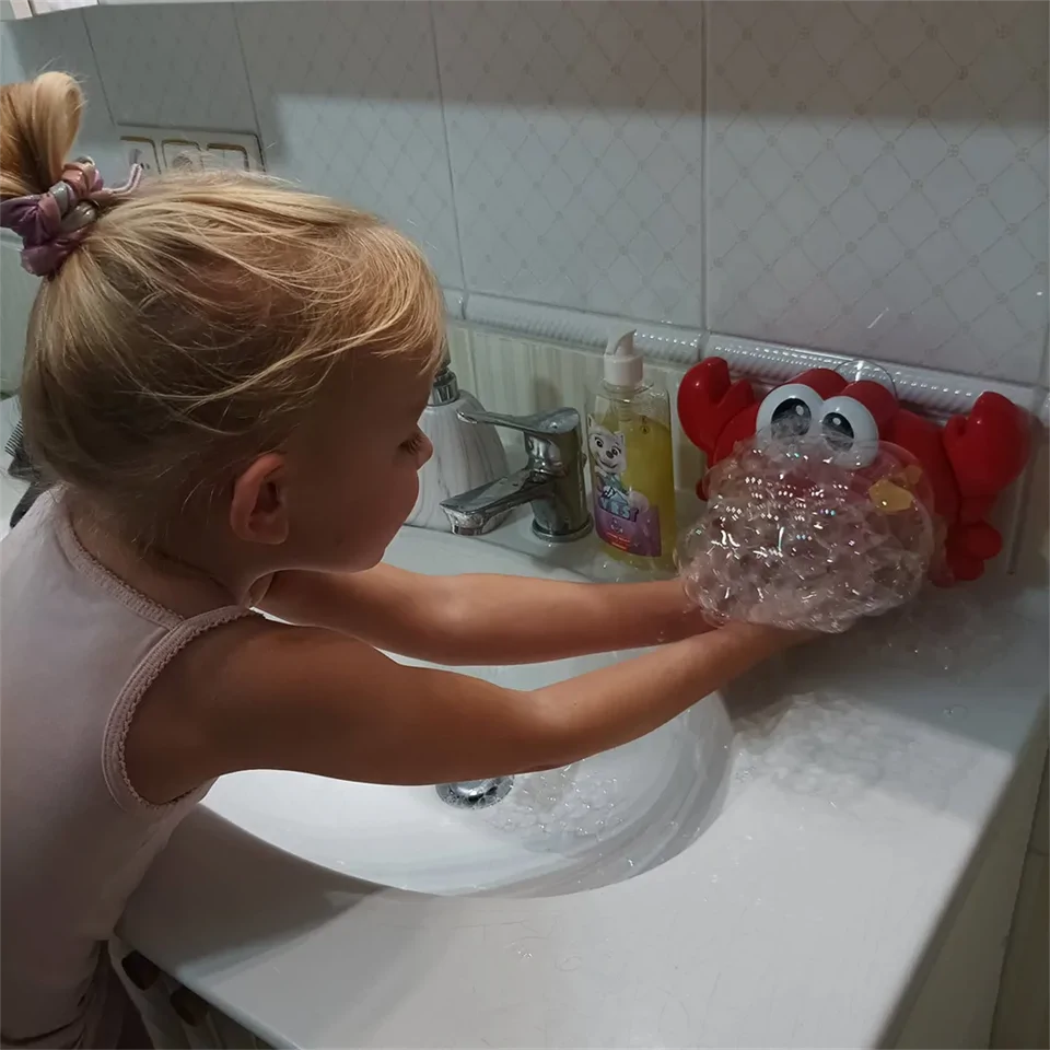 Zenélő, szappanbuborék készítő fürdőjáték - tarisznyarák erős tapadókoronggal, vidám dallamokkal
