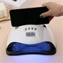 SUN Y9 UV LED professzionális műkörmös lámpa telefontartóval, beépített mozgásérzékelővel és hordozófüllel - 192W